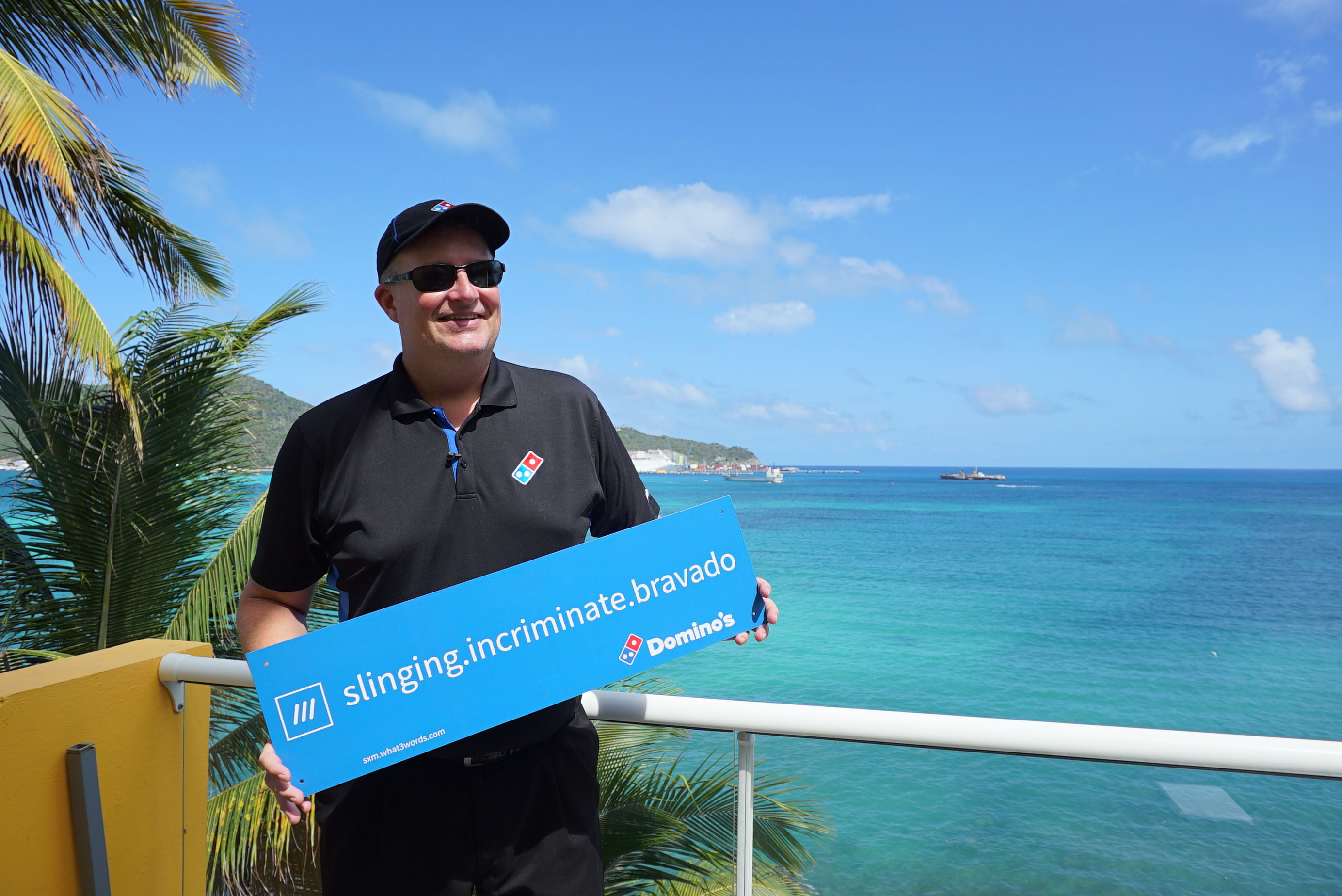 dominos pizza man holding personalised sign