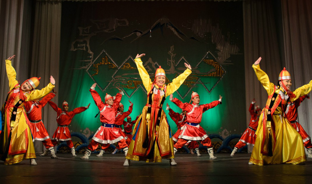 group of oriental dancers dancing in sync