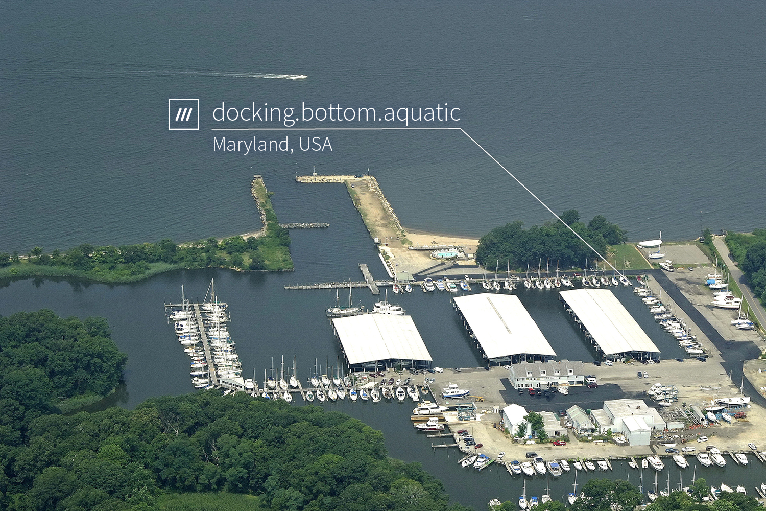 boats docked at a port at 3 word address docking.bottom.aquatic