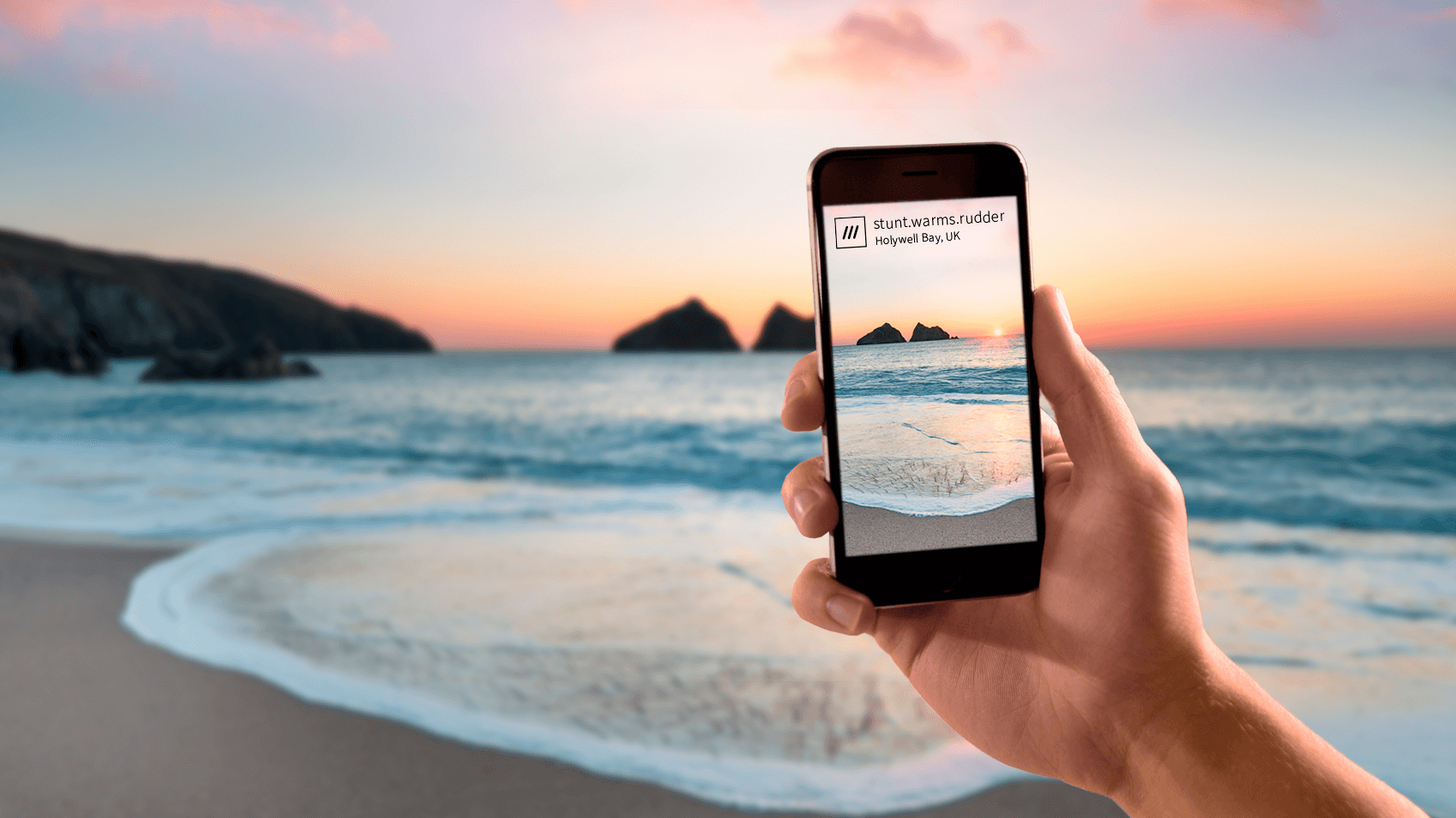 woman holding smartphone talking a photo of a sunset