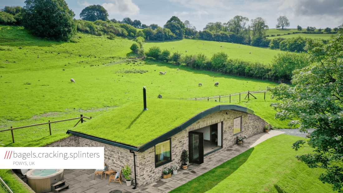 Cottage with grass roof in countryside at 3 words address Bagels.Cracking.Splinters