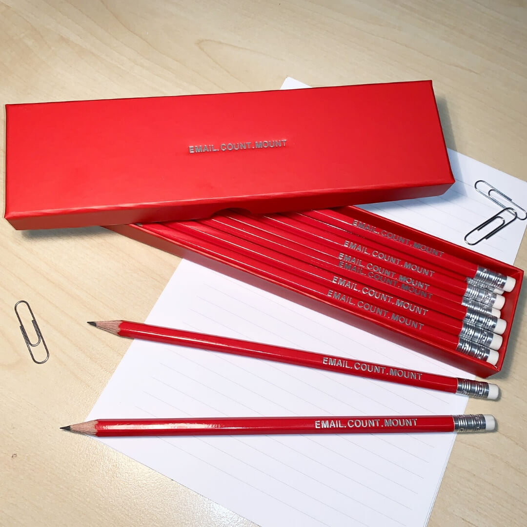 Personalised pencil box and pencils with a what 3 words address engraved on