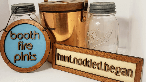 Pinwheel Productions wooden signs